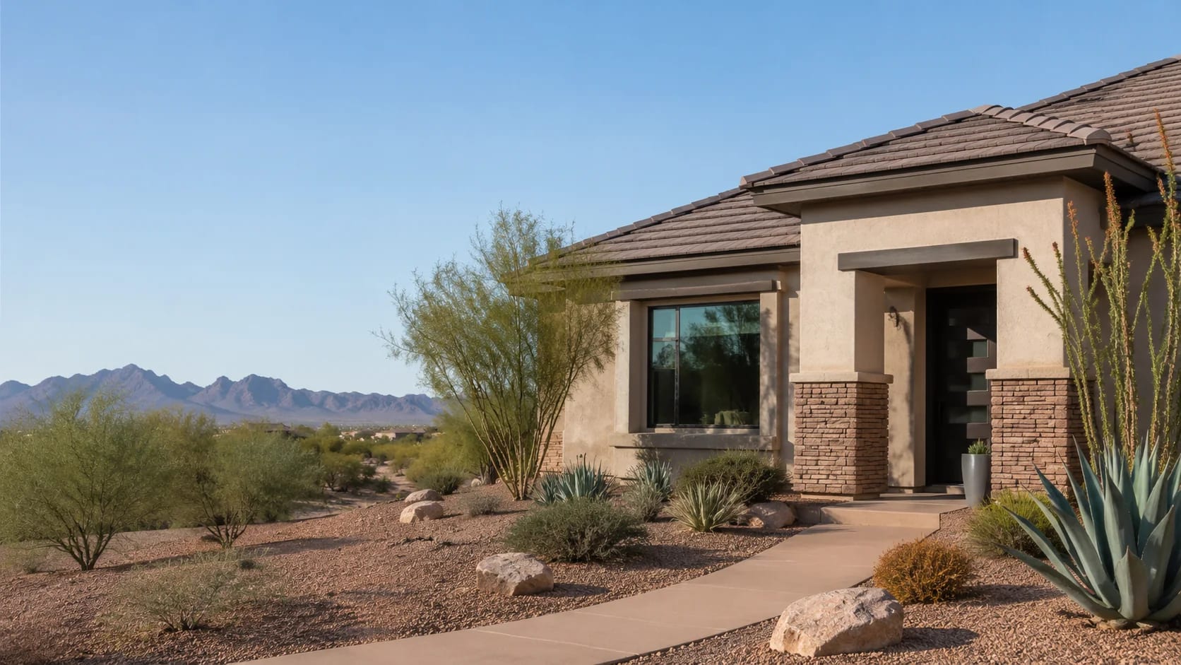 Single-story Apache Junction, Arizona home with desert landscaping and mountain views