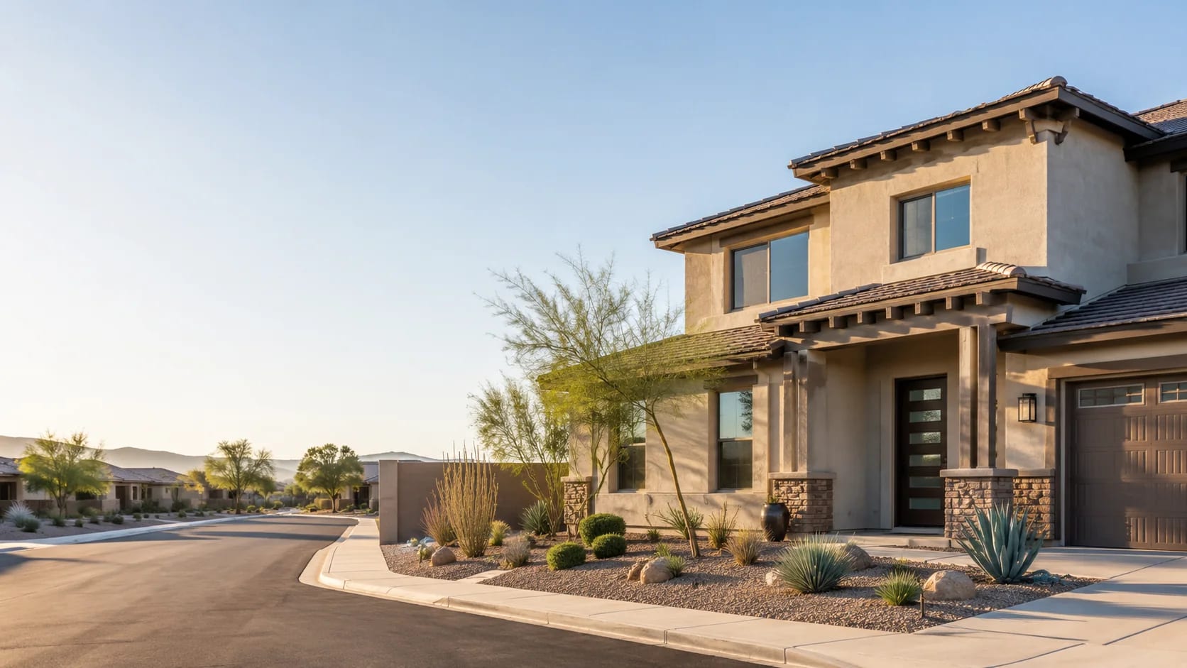 Two-story Goodyear, Arizona home with updated windows and desert landscaping