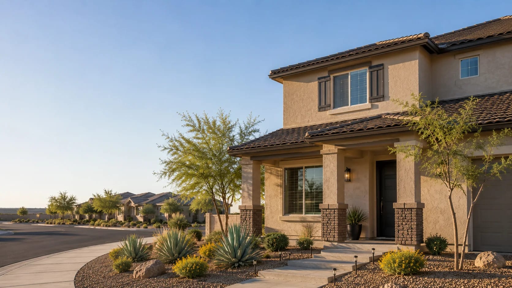 Two-story Maricopa, Arizona home with updated windows and desert landscaping