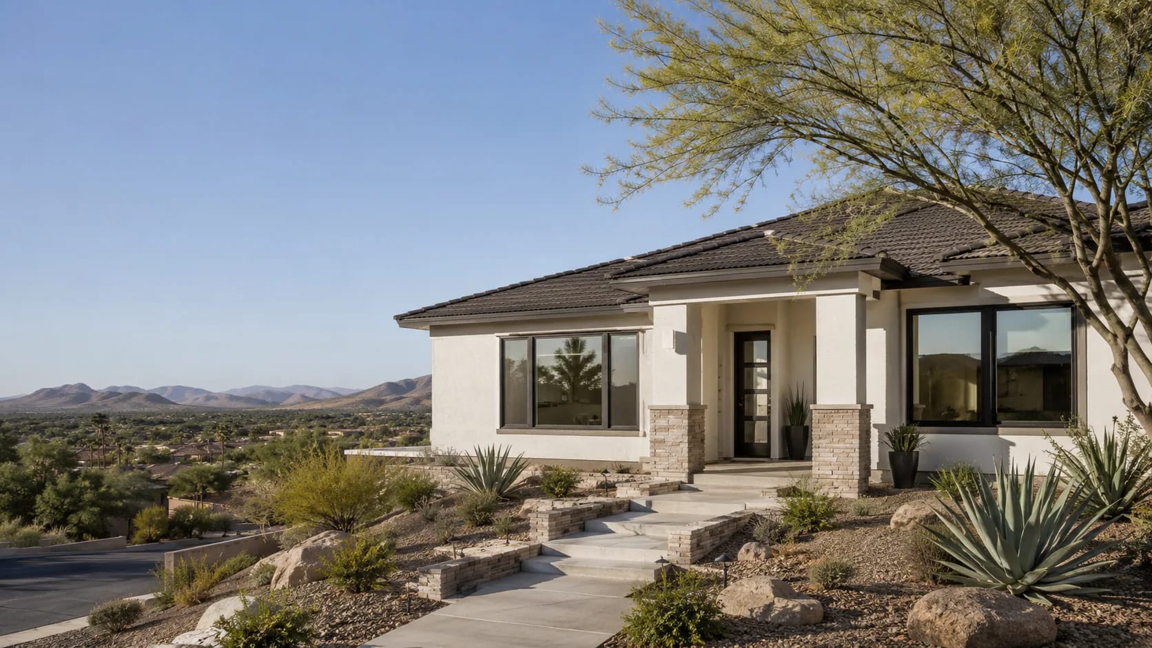 Phoenix-area home with desert landscaping and mountain views